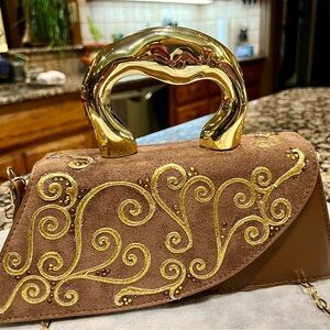 Luxurious Brown and Gold Clutch with Swirl Design